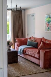 Joules Gilmorton, available exclusively at DFS at Novas Recovery House with stunning art by Caroline Duffy and rug by Kukoon